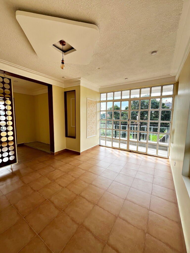 Four bedroom semi-detached house for sale in Kigo: bedroom with full height windows