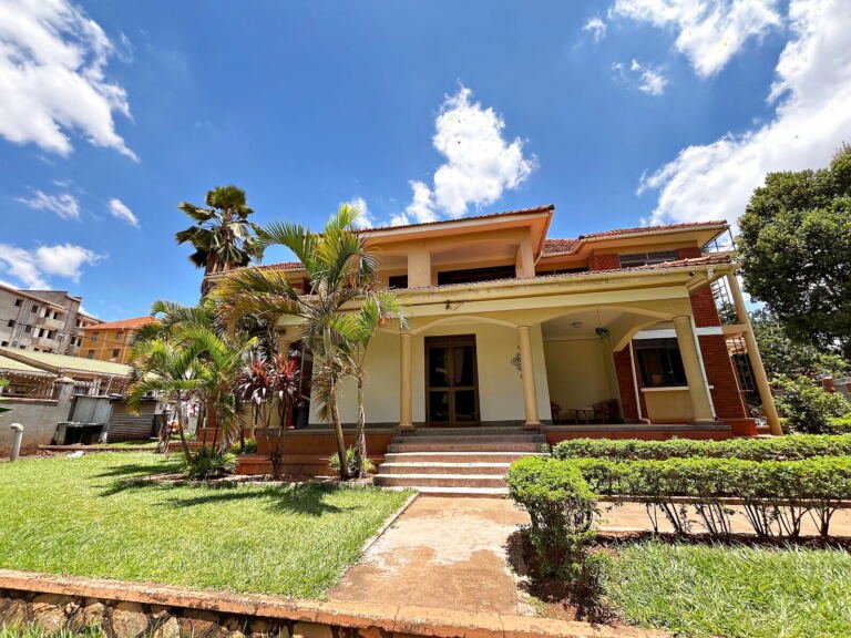 Five bedroom house for sale in Kiwatule, Ntinda: garden front with palms