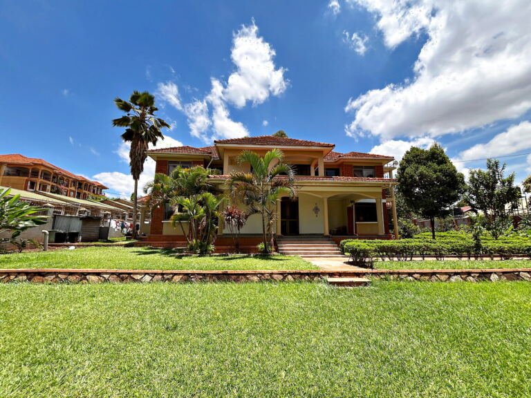 Five bedroom house for sale in Kiwatule, Ntinda: the house seen across the lawn